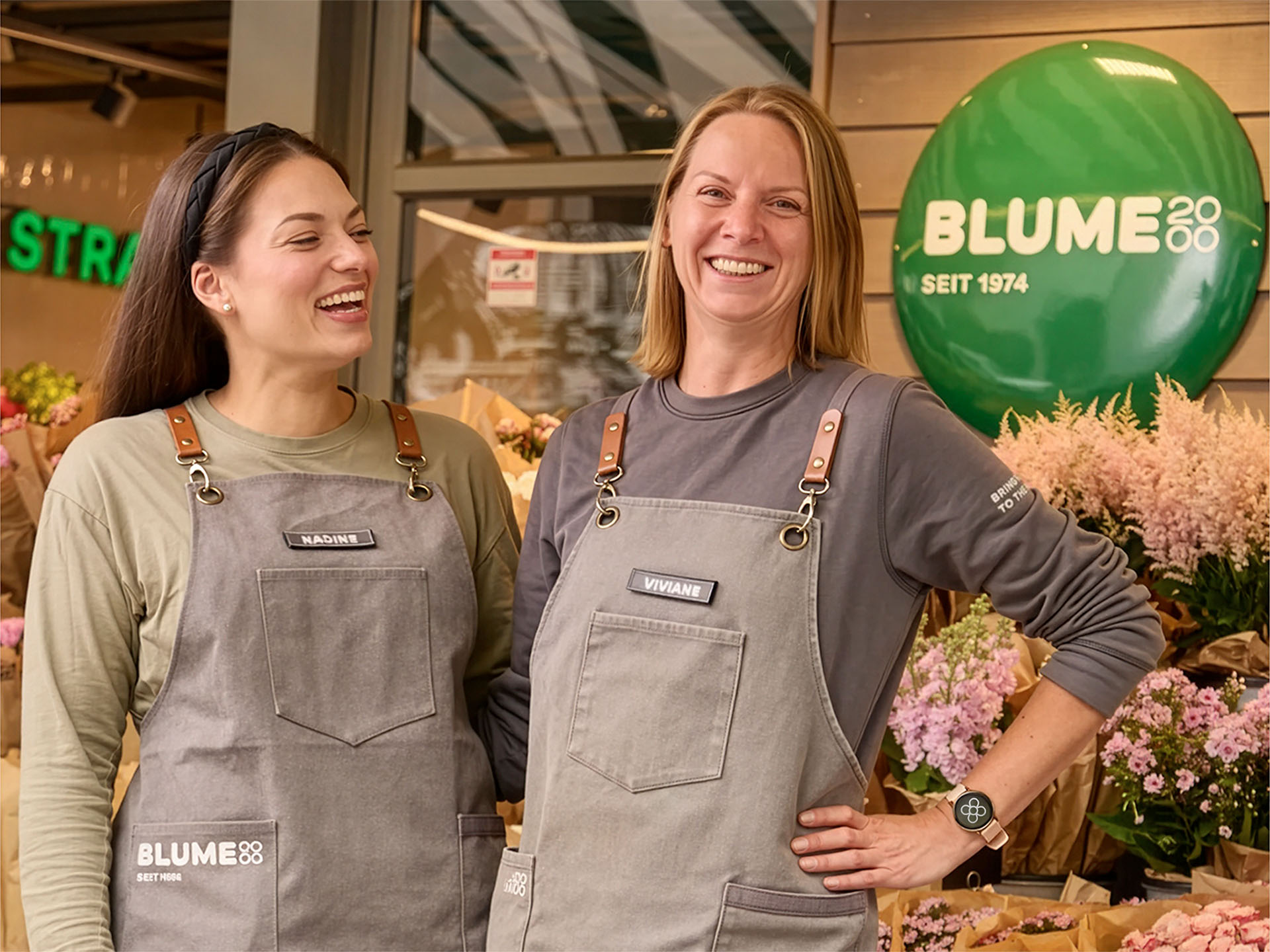 Blume2000 employees wearing the new Blume2000 logo.