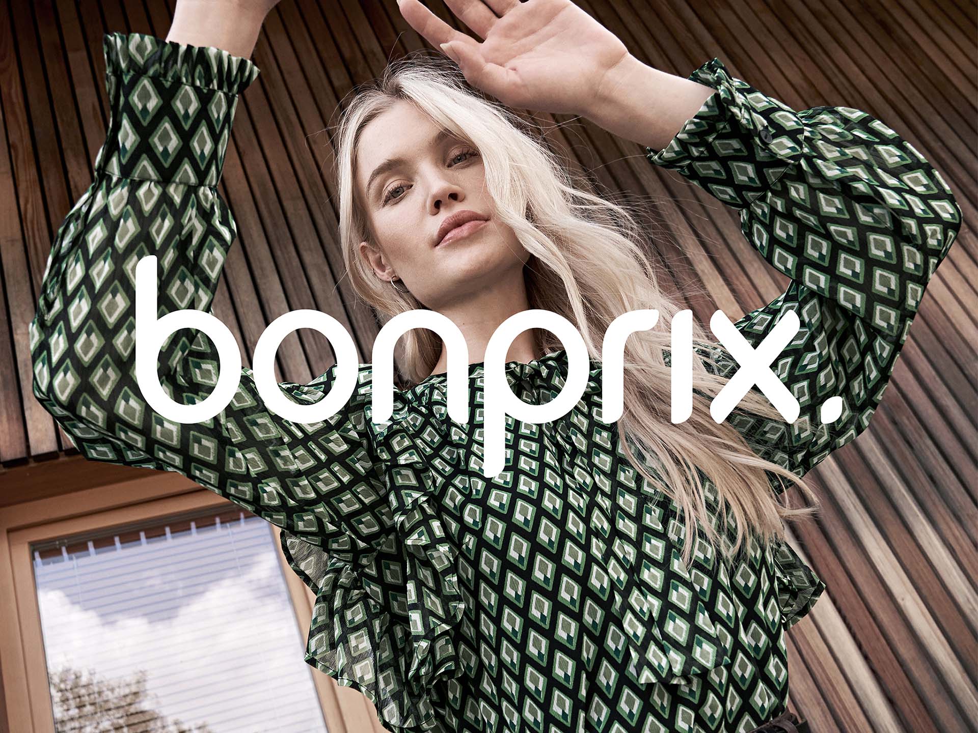 The new bonprix logo on the image of a model.