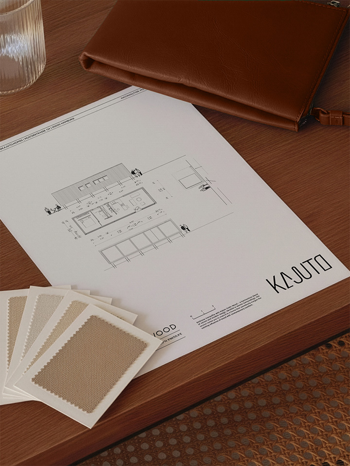 Kajuto stationary and textile samples on a table.